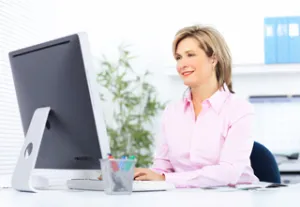 woman using a computer to schedule an appointment
